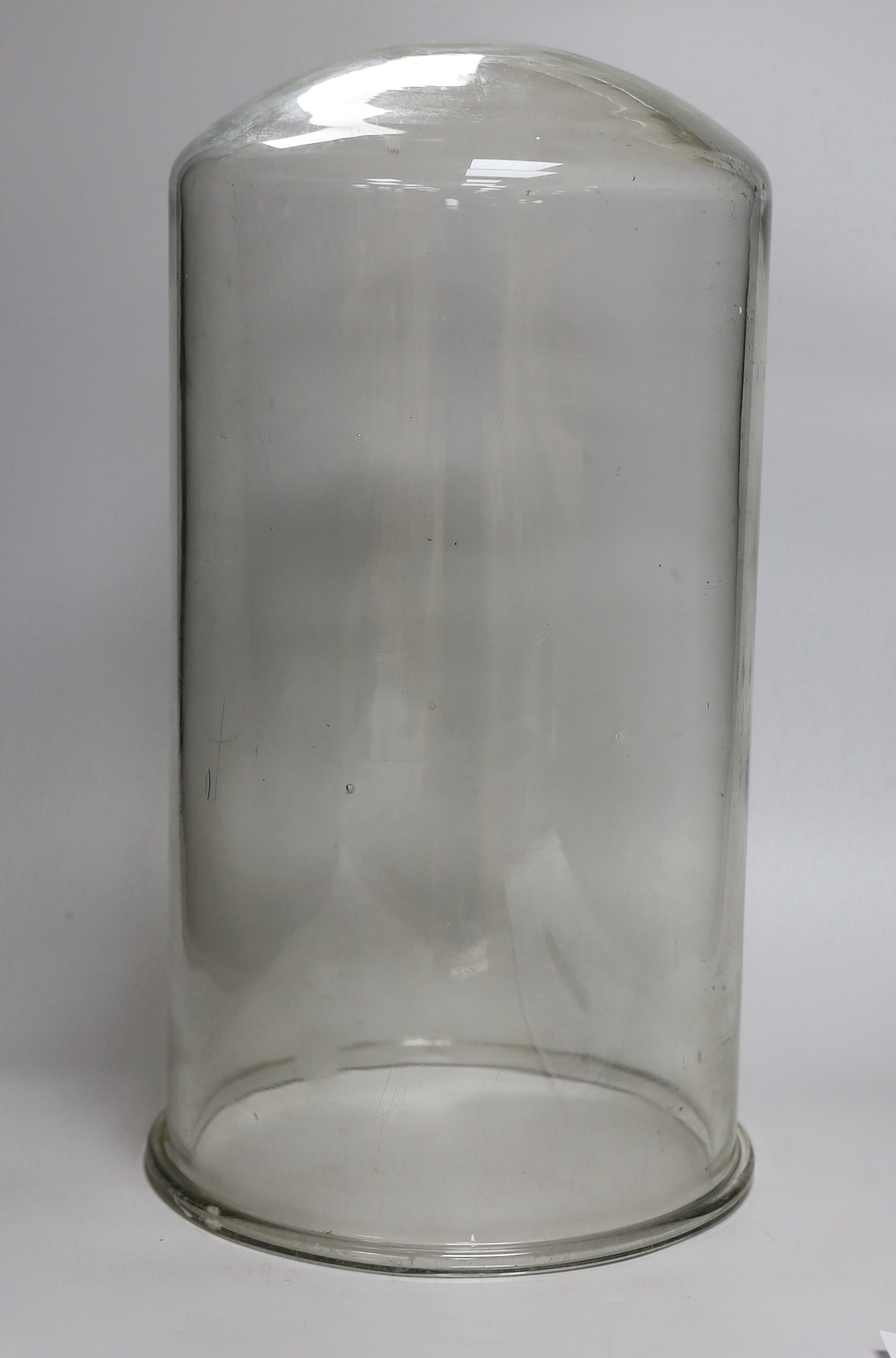 A glass display dome / bell jar. 45cm high